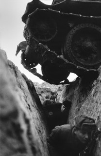 World war 2, battle of kursk, soviet t-34 tank driving over a trench with red army soldiers, 1943.