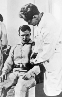 Soviet cosmonaut yuri gagarin undergoing a medical examination prior to his flight in vostok 1, 1961.