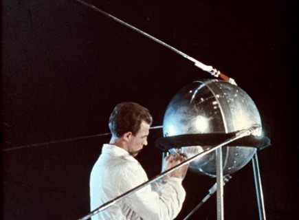 Soviet technician working on sputnik 1, 1957.