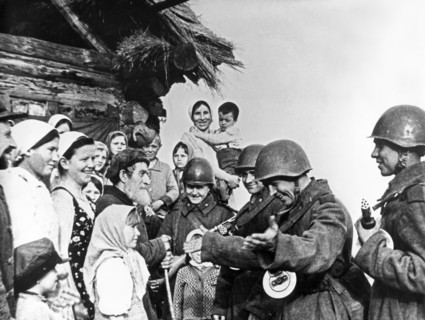 The population of a byelorussian village meeting the soviet red army liberators during world war 2.