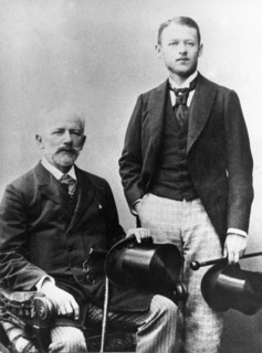 Pyotr tchaikovsky, the famous russian composer (seated) with his nephew v, davydov.