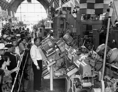 A machine that produces bushings for harvesters' cutting devices on display in the central hall of the ussr economic achievements exhibition in moscow ussr 1959.