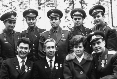 A memorial photo taken upon the return of the 3 cosmonauts of the voskhod mission to 'star town' near moscow: (1st row l to r) boris yegorov, konstantin fecktistov, valentina tereshkova, vladimir koma...