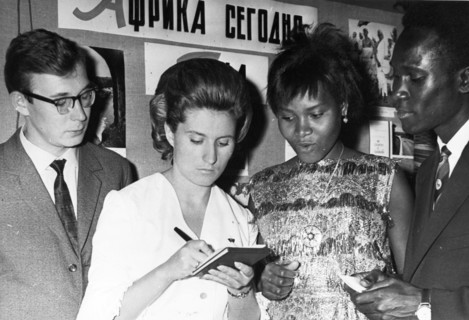 Moscow university student v, okonechnikov and member of the lenin regional komsomol committee, v, nerutcheva with students of the patrice lumumba university (l to r) g, kibuka (uganda) and ali bichio ...