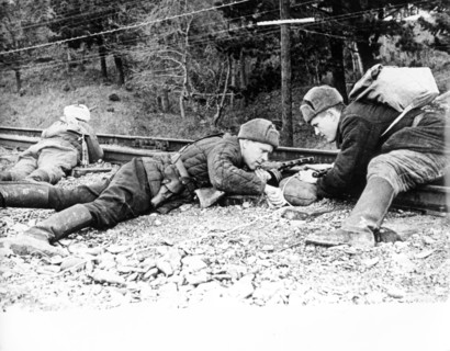 Partisans preparing to blow up a railroad track, the military victories of the soviet forces were backed up by the soviet partisans on the enemy-held terrain, partisan detachments existed almost throu...