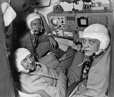 The crew of the soyuz 11 mission (l to r) test engineer viktor patsayev, commander georgi dobrovolsky, and flight engineer vladislav volkov in the cabin of the spacecraft, june 1971.
