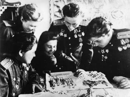 Soviet women's squadron, soviet women pilots, world war 2, left to right: squadron navigator yekatrina (katya) ryabova; flight commander raisa yushchina: navigator mira paromova; squadron commanders n...