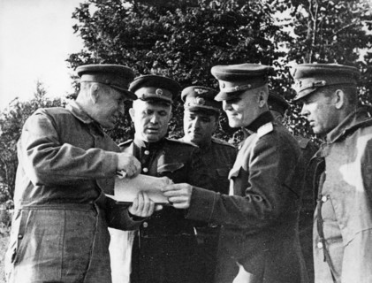 Nikita khrushchev and marshal konev at a command post of the 1st ukrainian front headquarters before the beginning of battle actions to liberate poland, june 1944.