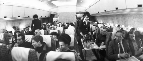 Passengers being served abord an aeroflot il-86 airliner on a newly inaugurated route between moscow and rostov-on-don, january 1983.