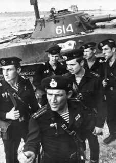 Ussr navy day, marines battalion commander ltc polosin outlining a task to squad leaders and a platoon commander during a training amphibious assault, july 1983.