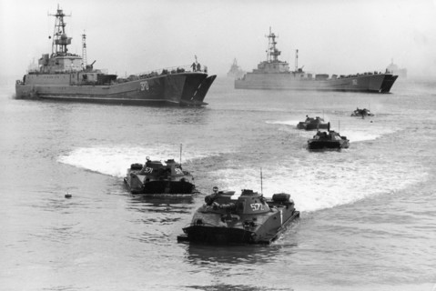 Soviet military exercises, pt-76 amphibious tanks disembarking from aboard landing ships, october 1988.