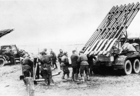 The picture shows the famous 'katyusha', truck-mounted multirail rocket launcher, in a firing position.