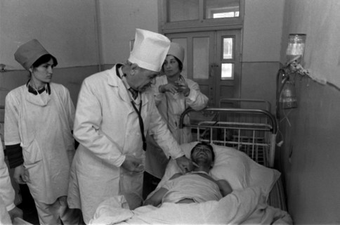 Khushkadam kamardinov, chief infectionist of tajikistan, is pictured during medical examination of one of the typhiod patients at an intensive therapy unit of a dushanbe's hospital on feb, 26th, typho...