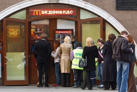 Moscow, russia, people queueing to buy food from the mcdonald's restaurant in central moscow's manezh square, fast food is rather popular with muscovites, april 26, 2006.