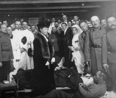 The photo 'empress maria fyodorovna presents the russian red cross society's decoration to a wounded soldier' (1916) is on view at the exhibition 'empress maria fyodorovna, the return' in the state ce...