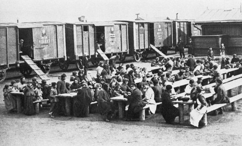 Trans-siberian railway under construction, early 20th century (1900?), settlers arrive at a station on trans-siberian railway.