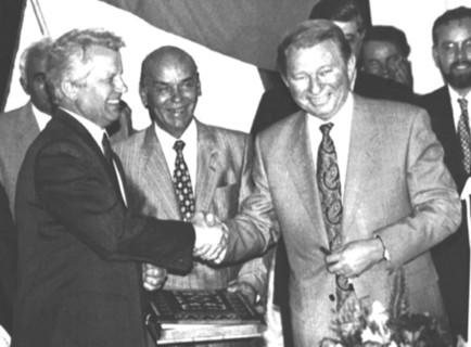 Ukrainian president leonid kuchma (right) and chairman of the ukrainian supreme soviet alexander moroz shake hands during the signing ceremony of the new ukrainian constitution held in marllnsky palac...