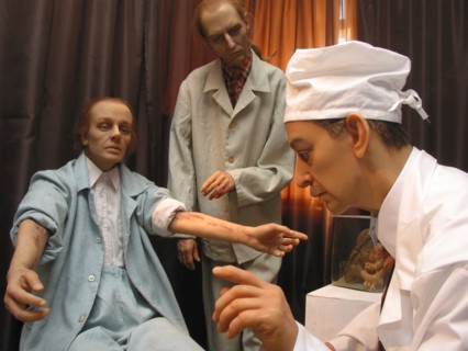 Headline: wax figures exhibition 'on the brink' caption: tas19: moscow, russia, april 18, 2003, the composition in the doctor's study (in pic), the st,petersburg museum of wax figures opened the exhib...