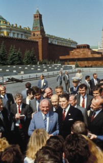 Ronald reagan with mikhail gorbachev in red square with reporters during his visit to the ussr, may 1988.