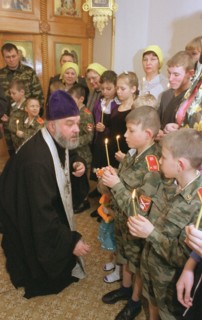 Kemerovo region, russia, january 31, 2002, father nikolai anointing with chrism young cadets (in pic) from orphanage in novokuznetsk (a city in siberia), about 20 inmates from 3 to 17 years old were b...