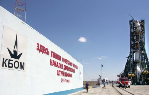 The resurs-dk1 remote sensing satellite is to launch aboard the soyuz-u rocket from baikonur cosmodrome in kazakhstan, june 16, 2006, the sign on the wall reads 'here, with the genius of the soviet pe...