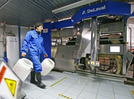 Operator is at work at the plemzavod rodina farm which is outfitted with delaval milking system, volgograd region of russia, february 5, 2008.