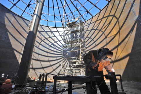 Amur region, russia, april 27, 2009, welder at work at skovorodino pump station, at the construction site of a branch pipeline which will run into china from the eastern siberia – pacific ocean (espo)...