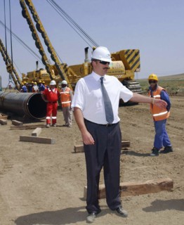 Azerbaijan, august 11, 2003, head of azerbaijan government ilkham aliyev (c) pictured visiting the construction site of the baku-ceyhan oil pipe line,on monday.