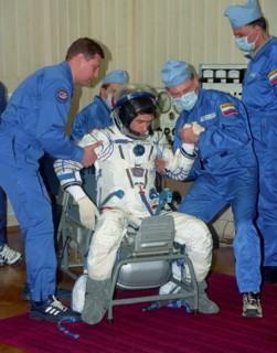 Kazakhstan, april 11, 2003, the soyuz tma-2 space crew commander colonel yuri malenchenko pictured trying on his space suit during preparation for the flight at cosmodrome baikonur, the spaceship soyu...