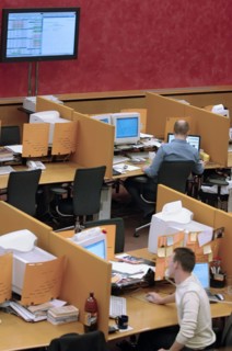 Brokers are pictured at their computers in the trading room at the moscow interbank currency exchange (micex), moscow, russia, 2006.