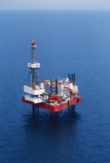 An offshore oil drilling rig 'astra' belonging to lukoil on the caspian sea, astrakhan region, russia, 2000.