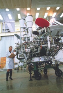 A tv broadcasting satellite in assembly.