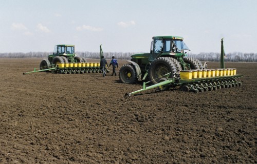American made john deere tractors sowing sugar beets on a farm in the stavropol territory of russia, late 1990s.