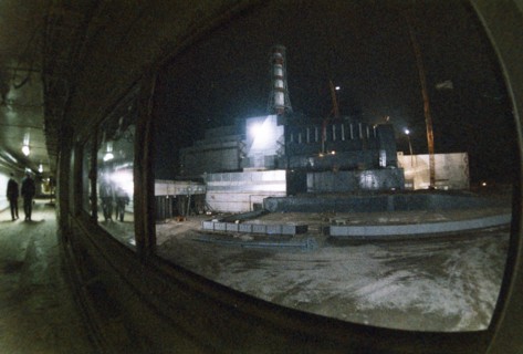 Chernobyl aps, ukraine, ussr, view of the unit 4 sarcophagus at night, december 1986.