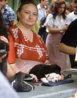Woman selling puppies at a pet market in moscow, 1989.