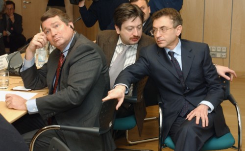 Moscow,russia, december 17, 2003, executive director of the 'yukos-moskva' company steven theede , vice-president of the 'yukos-moskva' alexander temerko and semyon kukes,chairman of the directors' bo...