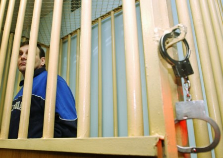 Moscow, russia, may 19, 2004, former federal security service colonel mikhail trepashkin (left) seen in the dock as moscow military district court sentenced him to four years in prison.