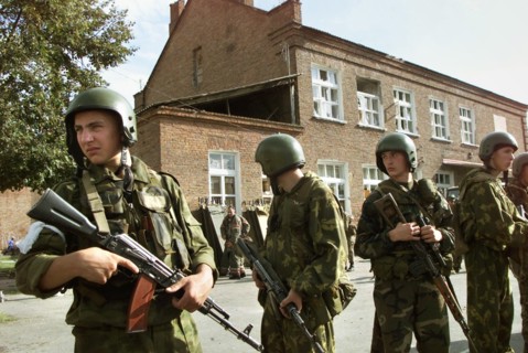 Beslan, north ossetia, russia, september 3, 2004, servicemen with litters prepared for wounded in the yard of the school seized by terrorists.