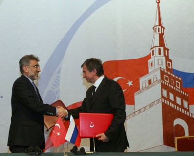 Kazan, russia, march 4, 2011, turkish energy minister taner yildiz (l) and russian vice-prime minister igor sechin shake hands during the signing ceremony at the 11th meeting of the russian-turkish in...