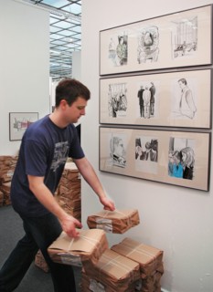Moscow, russia, may 24, 2005, a stand with drawings made by pavel shevelev during a trial of mikhail khodorkovsky and platon lebedev, drawings on khodorkovsky-lebedev trial are exhibited in the kovche...