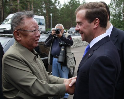 Ulan-ude, russia, august 24, 2011, russia's president dmitry medvedev (r) welcomes kim jong-il (kim jong il), the leader of the democratic people's republic of korea (north korea), the chairman of the...
