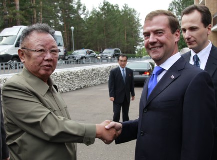 Ulan-ude, russia, august 24, 2011, russia's president dmitry medvedev (r) welcomes kim jong-il (kim jong il), the leader of the democratic people's republic of korea (north korea), the chairman of the...