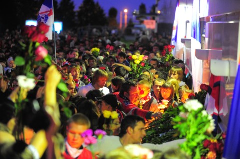 Yaroslavl, russia, september 7, 2011, lokomotiv yaroslavl fans lay flowers outside arena-2000 stadium to commemorate players of a khl ice hockey team lokomotiv who died in a yak-42 passenger plane cra...