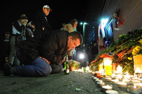 Yaroslavl, russia, september 8, 2011, lokomotiv yaroslavl fans commemorate players of a khl ice hockey team lokomotiv who died in a yak-42 passenger plane crash on september 7 by laying flowers and li...