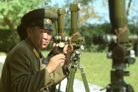North korean border guard on the frontier with south korea at an observation post, 2002.