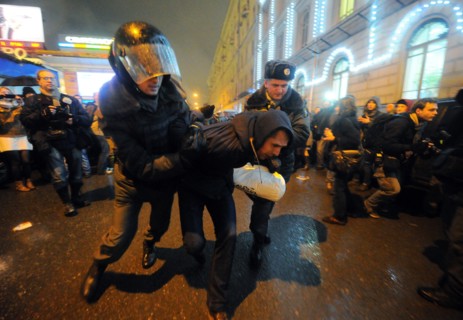 Moscow, russia, december 5, 2011, riot police detain demonstrators during an opposition protest in central moscow against alleged vote-rigging in the december 4 parliamentary election.