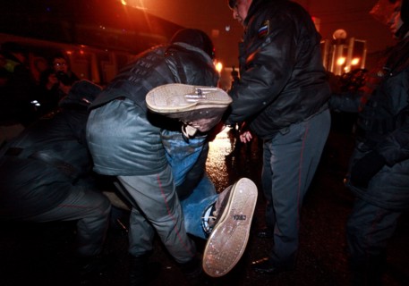 Moscow, russia, december 5, 2011, police detain demonstrators during an opposition protest in central moscow against alleged vote-rigging in the december 4 parliamentary election.