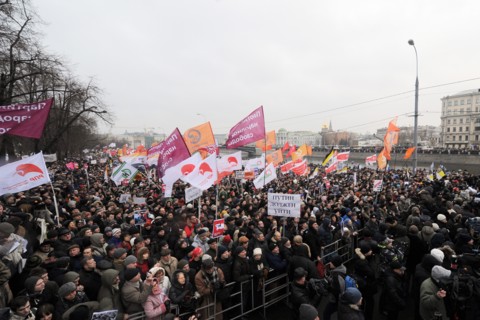 Moscow, russia, december 10, 2011, people attend an authorized rally 'for honest elections' in moscow's bolotnaya square to protest against electoral fraud at recent elections to the state duma.