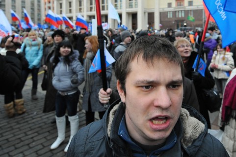 Moscow, russia, december 12, 2011, young demonstrators chant slogans during a rally staged by pro-kremlin youth groups in central moscow, the event took place two days after a mass protest against all...