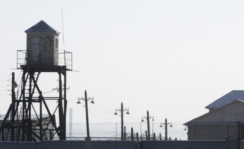 Chita, russia, january 26, 2006, a watch tower and barbed wire fence of the chita prison camp #3, where mikhail khodorkovsky, the former yukos boss, might be transferred to from the krasnokamensk pris...